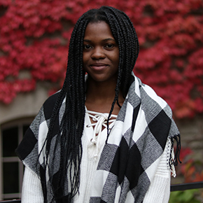 headshot of Olowatitomi Adebajo